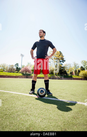 Soccer player waiting to start play Stock Photo