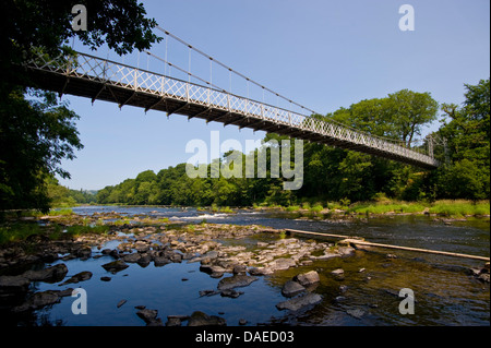 Suspension bridge over River Wye near Llanstephan Powys Mid Wales UK Stock Photo