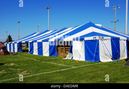 Striped or circus tent at local fair Stock Photo