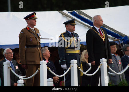 Air Chief Marshal Sir Stuart Peach, Vice Chief of the Defence Staff (centre), the Mayor of Mönchengladbach, Norbert Bude (right) and the General Officer Commanding British Forces Germany, Major General John Henderson (left) at a Beating Retreat ceremony at the Rheindahlen Military Complex, Germany Stock Photo