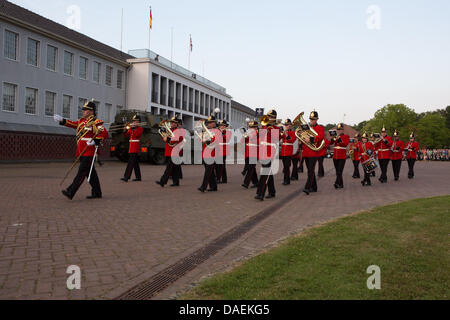 The Band of the Prince of Wales's Division performs in a Beating Retreat ceremony in front of The Big House, Rheindahlen Military Complex, Germany Stock Photo