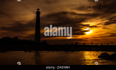 Sunset over the Barnegat Lighthouse - Barnegat Light - New Jersey Stock Photo