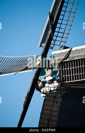 The sails of an old traditional windmill in Zaanse Schans