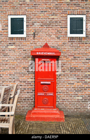 A red post stand in Zaanse Schans Stock Photo