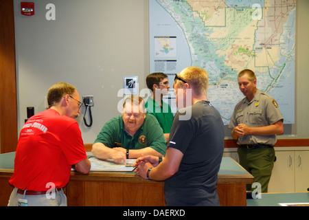 Miami Florida,Florida City,Everglades National Park,Main Park Road,Ernest Coe Visitor Center,information,desk,help,man men male adult adults,ranger,he Stock Photo