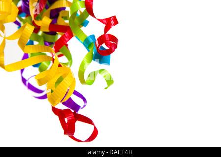 Multi-colored curly ribbons on a white background with copy space Stock Photo
