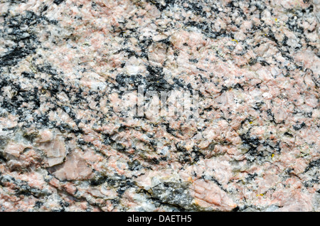 A piece of grantite mineral as background Stock Photo