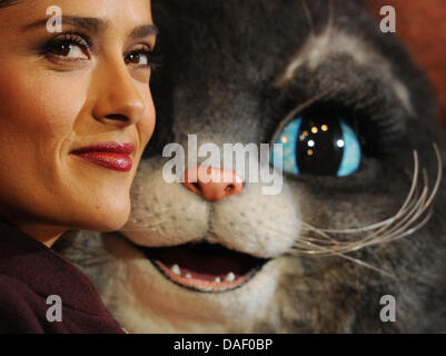 Mexican actress Salma Hayek poses during the premiere of the animated movie 'Puss in Boots' at the Cinestar Cinema, Potsdamer Platz in Berlin, Germany, 22 November 2011. She is the dubbing voice of one of the main characters. The movie starts showing in cinemas 08 December 2011. Photo: Jens Kalaene Stock Photo