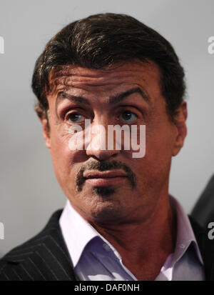 US actor Sylvester Stallone poses during a photo call at the Stage Entertainment musical company in Hamburg, Germany, 20 November 2011. The boxer musical 'Rocky' is said to premiere in Hamburg in 2012. Photo: Christian Charisius Stock Photo