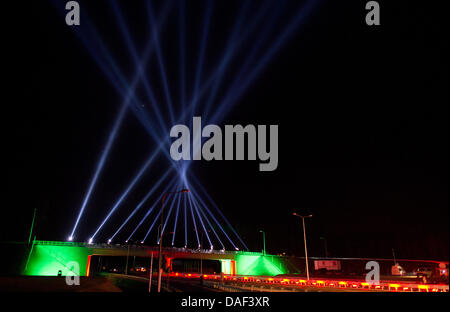 A light show is part of the ceremony to open the new Polish highway A 2 near Trzciel, Poland, 30 November 2011. The new part of the Polish highway A 2 was opened on the same evening. The around 100 kilometer long stretch is the extension of the German autobahn A 12 in the direction of Poznan. It will be open to traffic on Thursday. Traveling on the new stretch of highway will be fr Stock Photo