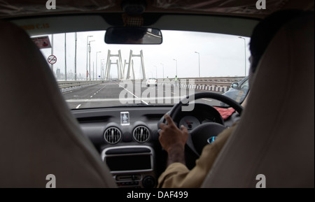 Taxi crossing Bandra–Worli Sea Link, officially called Rajiv Gandhi Sea Link, Mumbai, India Stock Photo