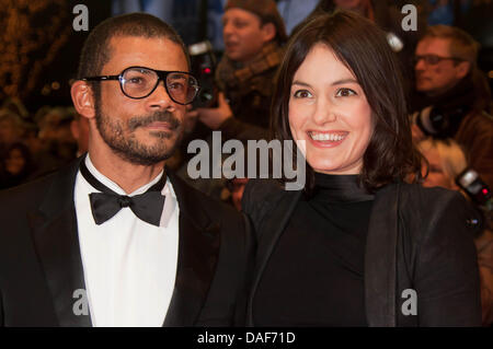 Actress Nicolette Krebitz and Mark Brandenburg arrive at the premiere of 'True Grit' at the 61st Berlin International Film Festival, Berlinale, at Berlinalepalast in Berlin, Germany, on 10 February 2011. Photo: Hubert Boesl dpa Stock Photo