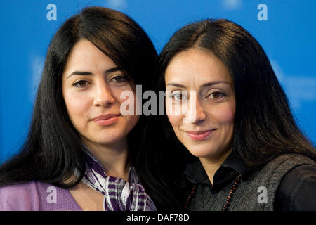 Turkish-born German director Yasemin Samdereli (R) and Turkish-born German scriptwriter Nesrin Samdereli pose during the photocall for the film 'Almanya' ('Almanya - Willkommen in Deutschland') during the 61st Berlin International Film Festival in Berlin, Germany, 12 February 2011. The film is running in the section competition out of competition of the International Film Festival. Stock Photo