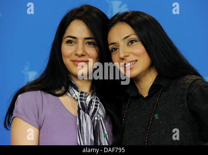 Turkish-born German director Yasemin Samdereli (R) and Turkish-born German scriptwriter Nesrin Samdereli poses during the photocall for the film 'Almanya' ('Almanya - Willkommen in Deutschland') during the 61st Berlin International Film Festival in Berlin, Germany, 12 February 2011. The film is running in the section competition out of competition of the International Film Festival Stock Photo