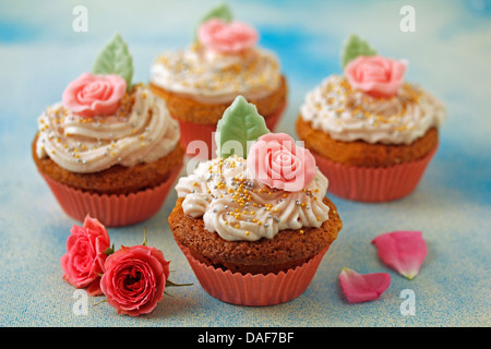 Roses cupcakes. Recipe available. Stock Photo