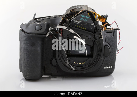 Broken Camera, Canon 5D MkIII,  Smashed camera, pieces of a camera , Canon 5D Mkiii. Camera in pieces Stock Photo