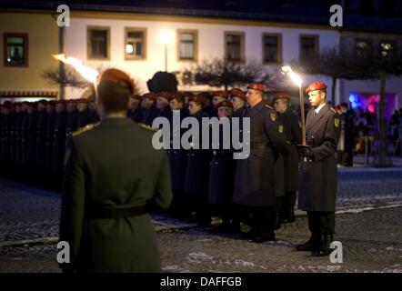 Bundeswehr soldiers stand in line at the Bundeswehr camp in Kundus ...