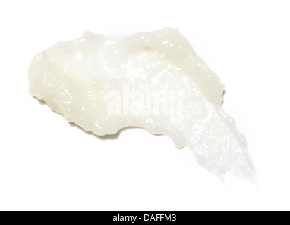 beige yellow body scrub paste cut out onto a white background Stock Photo