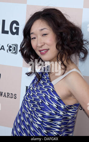 Actress Sandra Oh arrives at the 26th Annual Spirit Awards in a tent on Santa Monica Beach in Los Angeles, USA, on 26 February 2011. Photo: Hubert Boesl Stock Photo