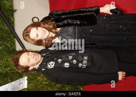 US producer Jerry Bruckheimer and his wife Linda Bruckheimer arrive at the Vanity Fair Oscar Party at Sunset Tower in West Hollywood, Los Angeles, USA, on 27 February 2011. Photo: Hubert Boesl Stock Photo