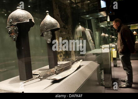 (dpa file) A file picture dated 12 November 2010 of Celtic helmets and swords on display at Voelklinger Huette in Voelklingen, Germany. Photo: Oliver Dietze Stock Photo