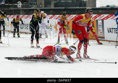 Norway's Maiken Caspersen Falla (L) and Mari Eide (R) race in the team sprint of the Cross-country skiing World Cup in Duesseldorf, Germany, 04 December 2011. Photo: Kevin Kurek Stock Photo