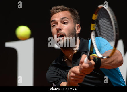 Stuttgart, Germany. 12th July, 2013. French tennis player Benoit Paire plays the ball during the quarter final against Hanescu from Rumania at the ATP Tournament in Stuttgart, Germany, 12 July 2013. Photo: MARIJAN MURAT/dpa/Alamy Live News Stock Photo