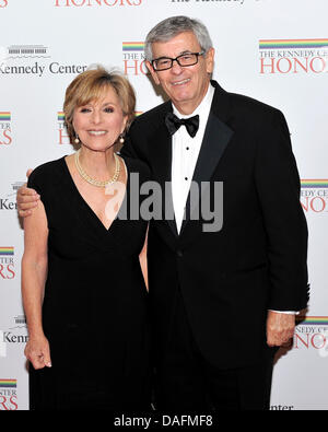 United States Senator Barbara Boxer (Democrat of California) and her husband, Stewart, arrive for the formal Artist's Dinner honoring the recipients of the 2011 Kennedy Center Honors hosted by United States Secretary of State Hillary Rodham Clinton at the U.S. Department of State in Washington, D.C. on Saturday, December 3, 2011. Credit: Ron Sachs / CNP Stock Photo