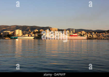 Early morning scene - Balearia fast ferry and Acciona / Trasmediterranea ferry 'Tenacia' - in the Port of Palma de Mallorca / Ma Stock Photo