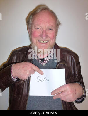 Member of the Irish folk band 'The Dubliners', Sean Cannon, pictured prior to a performance of his band in Hamburg, Germany, 3 December 2011. The Dubliners formed in Dublin in 1962. Photo:  Holger Kasnitz Stock Photo