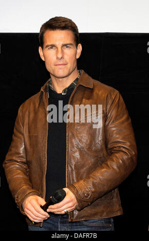 US actor Tom Cruise arrives for the German premiere of his movie 'Mission: Impossible - Ghost Protocol' at the BMW World in Munich, Germany, 09 December 2011. The movie will be aired on 15 December 2011. Photo: Ursula Dueren Stock Photo
