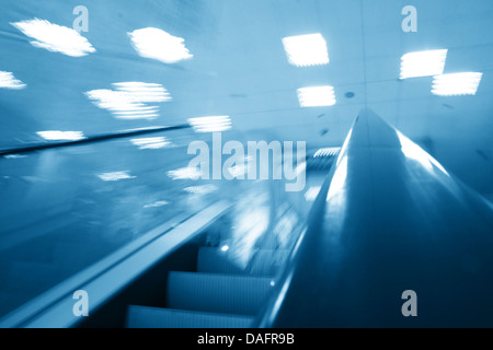 escalator transportation motion blured business background  Stock Photo