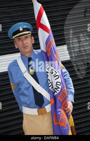 Southport, UK 12th July, 2013.   Ian Kerr of the Everton Road Protestand Boys band at the  Orangemen's Day parade assembling in London Street.  A number of Orange Order lodges accompanied by pipe and drum marching bands gathered in Southport for the annual Orange Day marches.  July 12 is the most important day of the loyalist calendar, when members of the Orange Lodge march to commemorate the 1690 Battle of the Boyne in Ireland.  Credit:  Conrad Elias/Alamy Live News Stock Photo