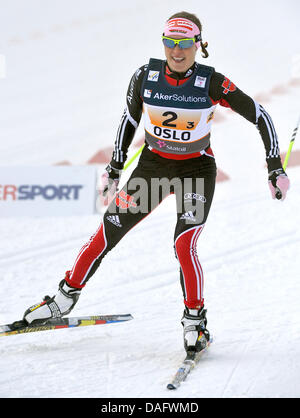 Evi Sachenbacher-Stehle of Germany competes in the Women's Cross Country Relay 4x5 km Clasic/Free final competition  at the Nordic Skiing World Championships in Oslo, Norway, 03 March 2011. Photo: Hendrik Schmidt Stock Photo