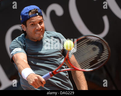 Stuttgart, Germany. 12th July, 2013. Germany's Tommy Haas returns the ball during the quarter final against Italy's Fognini at the ATP Tournament in Stuttgart, Germany, 12 July 2013. Photo: MARIJAN MURAT/dpa/Alamy Live News Stock Photo