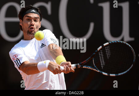 Stuttgart, Germany. 12th July, 2013. Italy's Fabio Fognini returns tha ball during the quarter final against Germany's Haas at the ATP Tournament in Stuttgart, Germany, 12 July 2013. Photo: MARIJAN MURAT/dpa/Alamy Live News Stock Photo