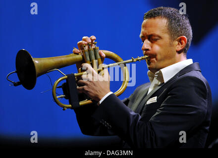 German jazz musician Till Broenner plays on his trumpet during the first performance of his Germany tour in Frankfurt, Germany, 15 March 2011. Broenner presented his new album 'At the End of the Day'. Photo: Arnde Dedert Stock Photo