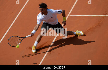 Stuttgart, Germany. 12th July, 2013. Italy's Fabio Fognini returns the ball during the quarter final against Germany's Haas at the ATP Tournament in Stuttgart, Germany, 12 July 2013. Photo: MARIJAN MURAT/dpa/Alamy Live News Stock Photo