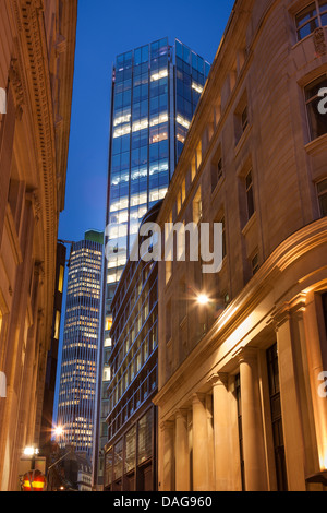 Office building in the City of London at night,Throgmorton Street towards Old Broad Street,England Stock Photo