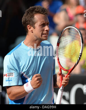 Stuttgart, Germany. 12th July, 2013. Germany's Philipp Kohlschreiber reacts after defeating France's Monfils during the quarter final match at the ATP Tournament in Stuttgart, Germany, 12 July 2013. Photo: MARIJAN MURAT/dpa/Alamy Live News Stock Photo