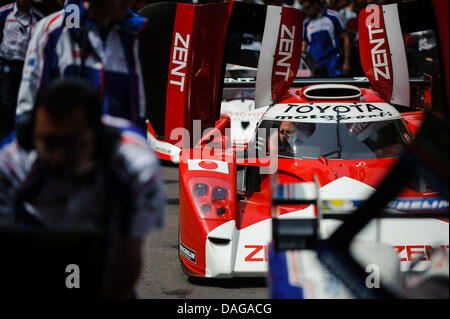 Chichester, UK. 12th July, 2013. A 1998 Toyota TS020 GT-One from Le Mans queues up for its run up the hill during Day 1 of the 2013 Goodwood Festival of Speed in the grounds of Goodwood House. Credit:  Action Plus Sports Images/Alamy Live News Stock Photo