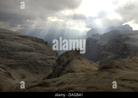 sunbeams breaking through cloud cover at Piz Boe, view to Val Lasties, Italy, Dolomites Stock Photo
