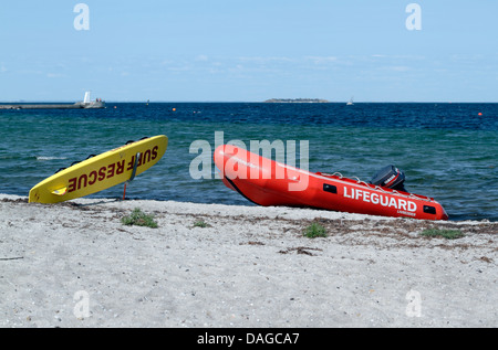 Lifeguard surf rescue board and inflatable lifeboat with outboard motor at Kastrup public baths, Amager, Copenhagen Stock Photo