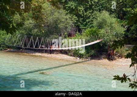 Rope bridge over Aheron river in Greece Stock Photo