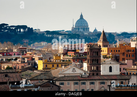 View to Saint Peter's Basilica over the medieval rooftops of Trastevere, Rome, Italy Stock Photo