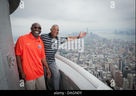 July 12, 2013 - Manhattan, New York, U.S. - Baseball Hall of Famer OZZIE SMITH, NY Mets Legend MOOKIE WILSON light the Empire State Building 'NY Mets Blue and Orange' to celebrate the start of MLB All-Star Week. (Credit Image: © Bryan Smith/ZUMAPRESS.com) Stock Photo