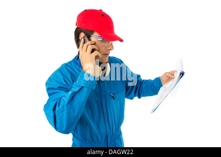 worker who looks at a project and talking on the phone Stock Photo