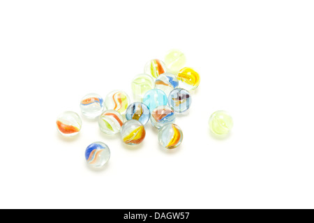 Some colourful marbles on white background Stock Photo