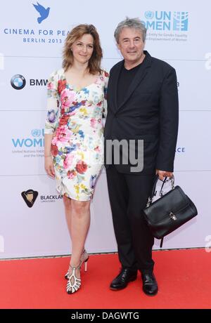 Berlin, Germany. 12th July, 2013. Actress Martina Gedeck and her husband, Swiss director Markus Imboden, arrive at the Cinema for Peace Dinner at the Soho House in Berlin, Germany, 12 July 2013. At the gala of the foundation Cinema for Peace the organization UN Women and its special envoy Nicole Kidman will be honored. Photo: JENS KALAENE/dpa/Alamy Live News Stock Photo