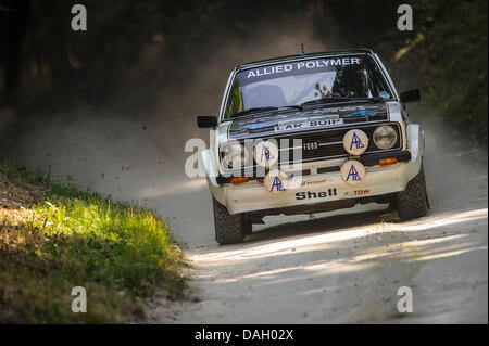 Chichester, UK. 12th July, 2013. A Ford Escort car in action on the rally stage during Day 1 of the 2013 Goodwood Festival of Speed in the grounds of Goodwood House. Credit:  Action Plus Sports/Alamy Live News Stock Photo